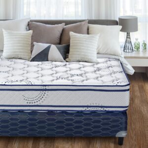 A neatly made bed with a patterned mattress and pillows.
